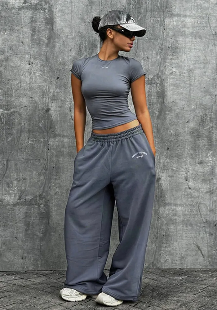 Sporty Chic Fitted Crop Top and Oversized Sweatpants Two-Piece Set